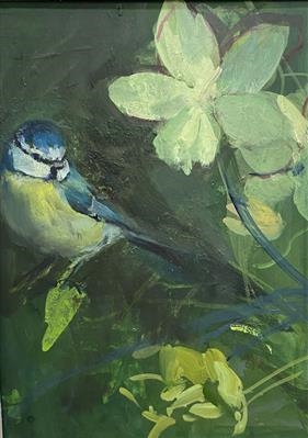 Blue tit with winter rose